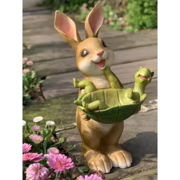 Pot de fleur lapin tenant tortue
