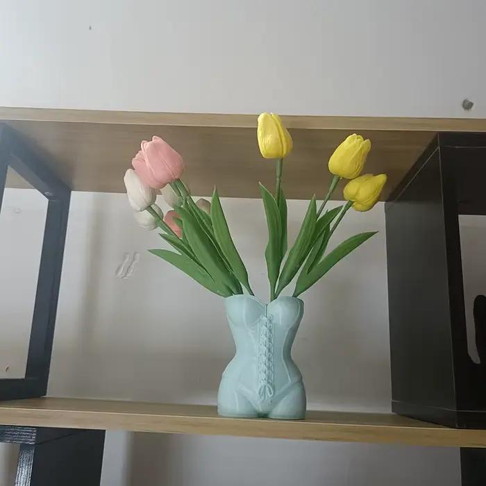 Vases en forme humaine