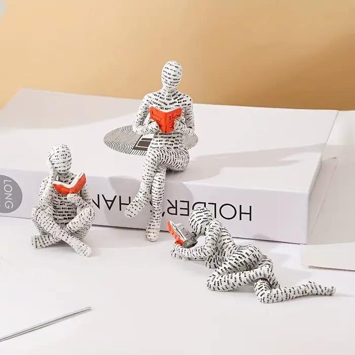 Statuette abstraite de lecteur