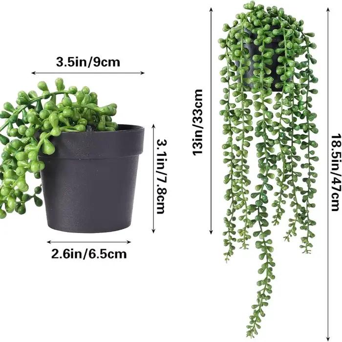 Plante artificielle suspendue au mur