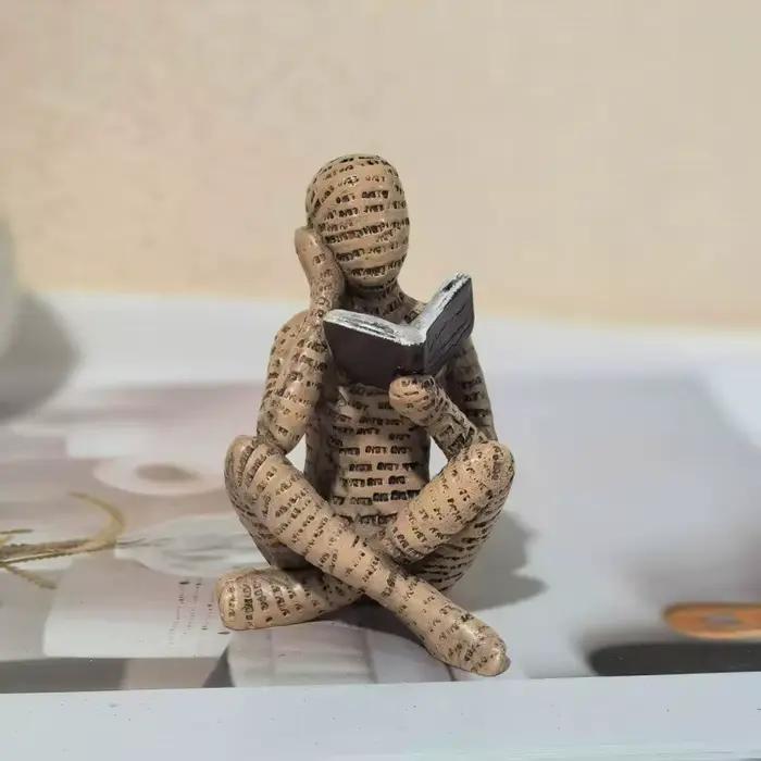 Statuette abstraite de lecteur