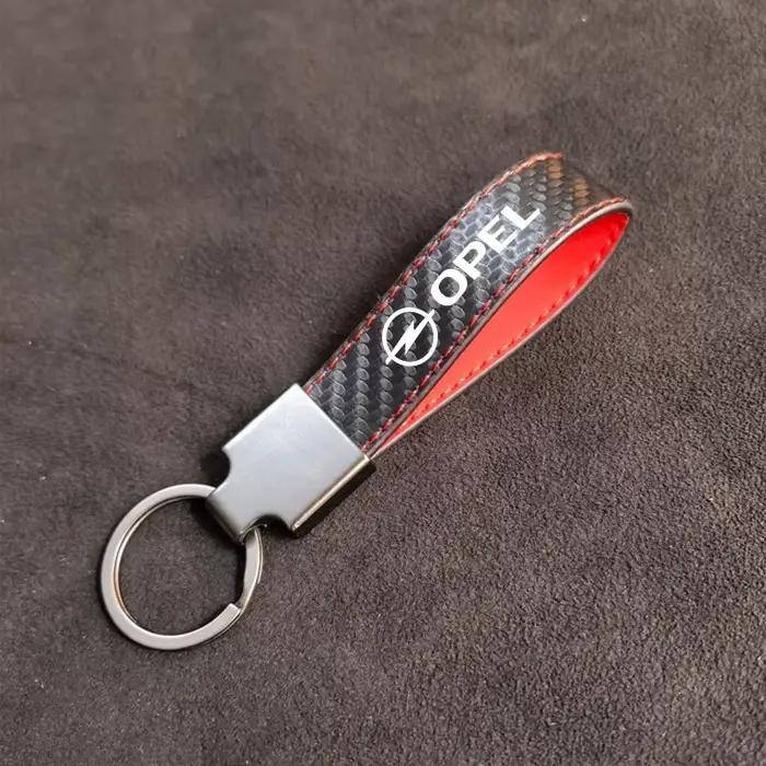 Porte-clés en Fiber de carbone, emblème Opel haut de gamme, pendentif, cadeaux pour Opel Corsa D Astra Insignia Combo OPC, accessoires Vauxhall
