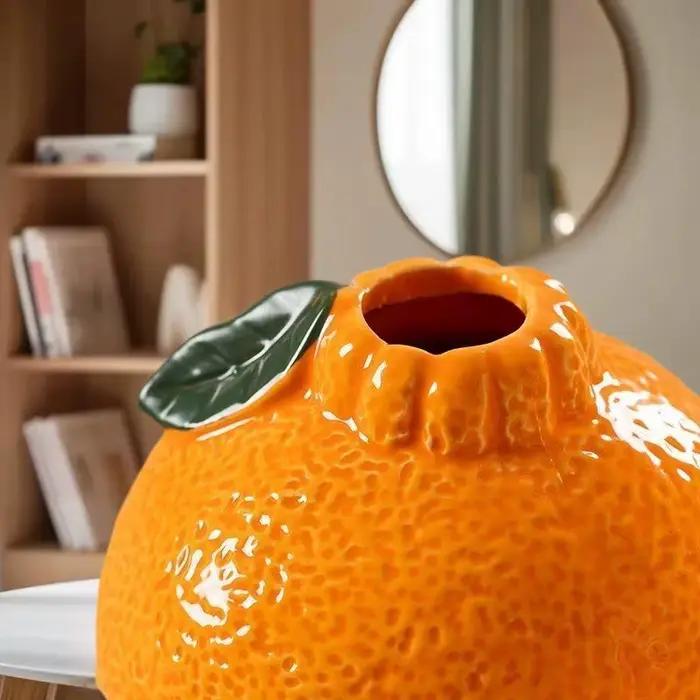 Décoration de table créative avec vase en forme de fruit orange