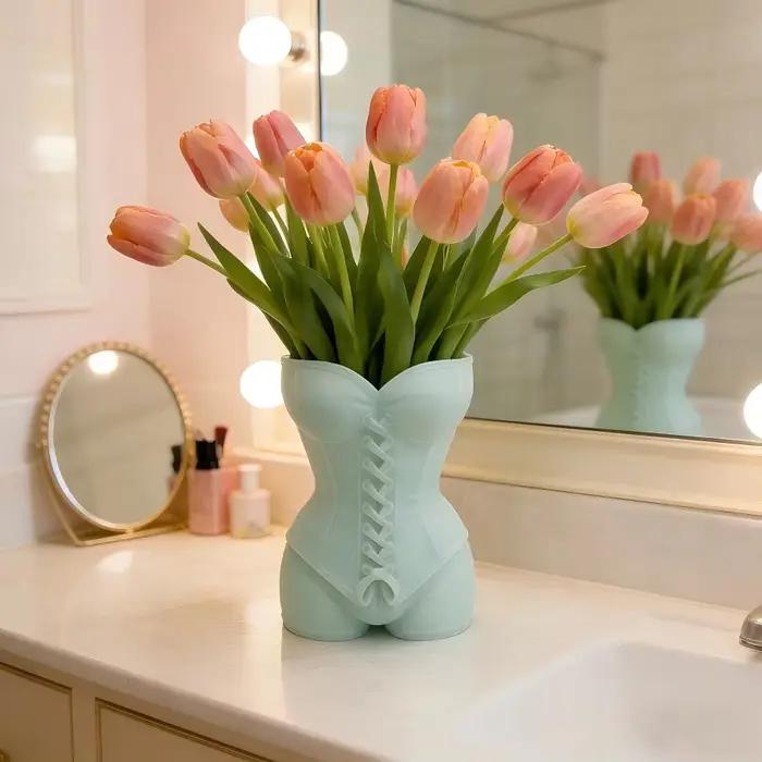 Vases en forme humaine