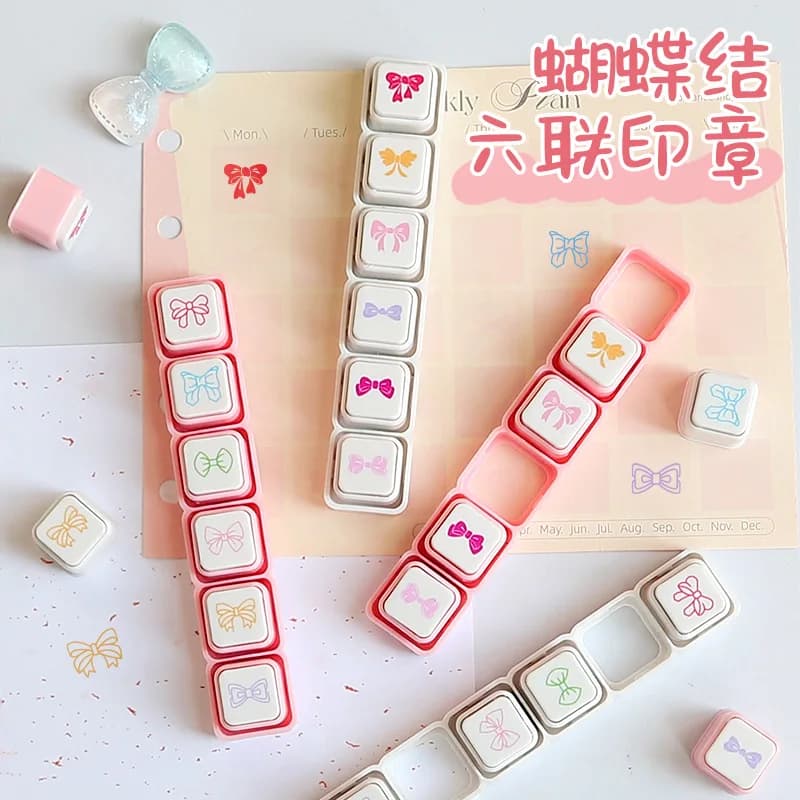 Nouveau nœud décoratif mignon avec six tampons détachables, parfait pour les décorations DIY, le journalisation et les enregistrements quotidiens.