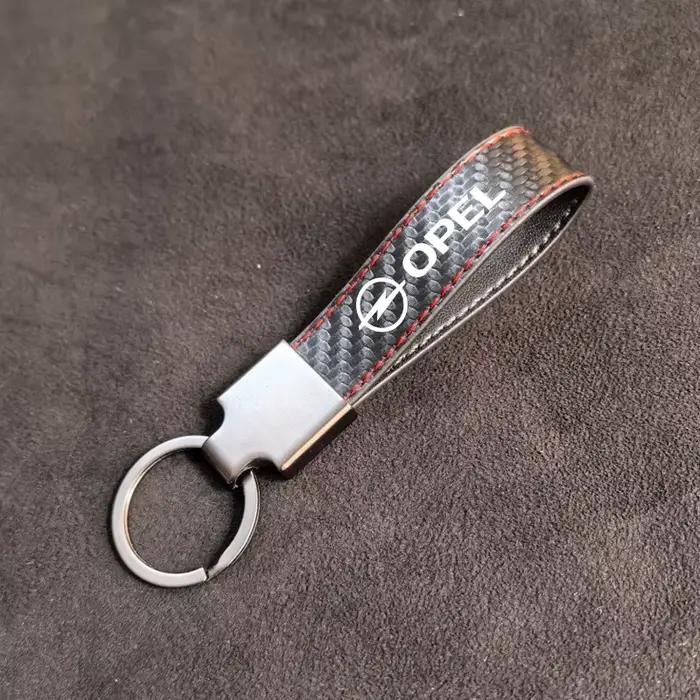 Porte-clés en Fiber de carbone, emblème Opel haut de gamme, pendentif, cadeaux pour Opel Corsa D Ast