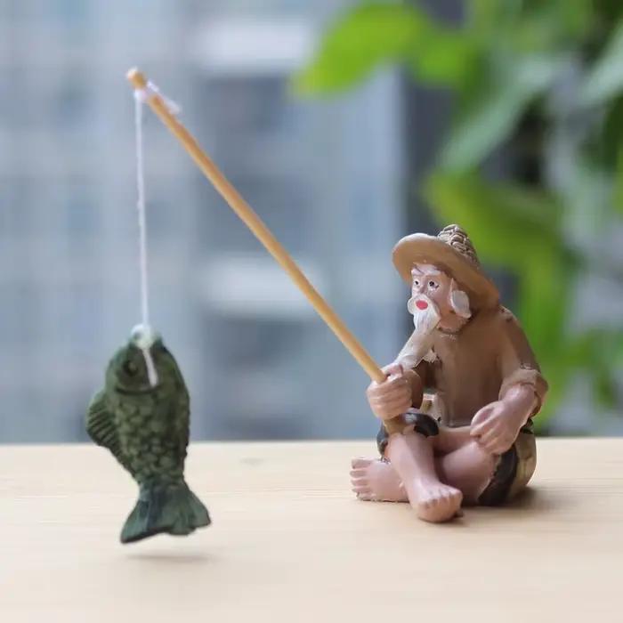 Statue en résine de vieil homme pêcheur