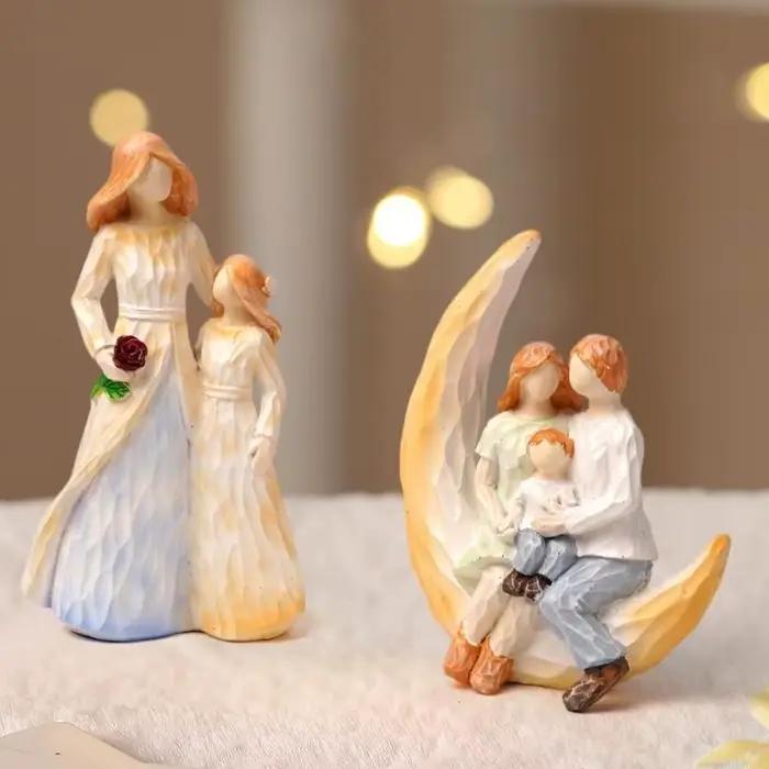 Figurines famille en résine