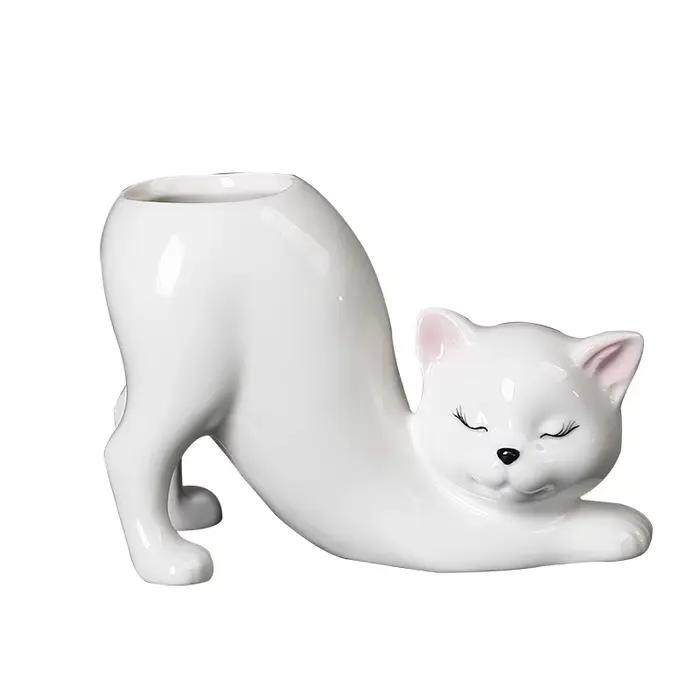 Pot de fleur de chat de dessin animé
