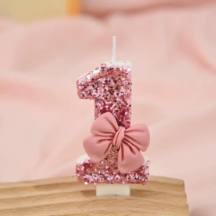 Bougie créative à paillettes scintillantes avec nœud rose pour gâteau d'anniversaire célébration festive élégante occasions spéciales
