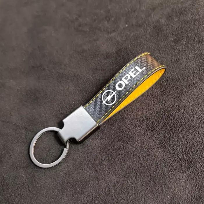 Porte-clés en Fiber de carbone, emblème Opel haut de gamme, pendentif, cadeaux pour Opel Corsa D Astra Insignia Combo OPC, accessoires Vauxhall