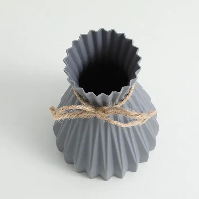 Vase à fleurs en plastique ne peut pas contenir de l'eau