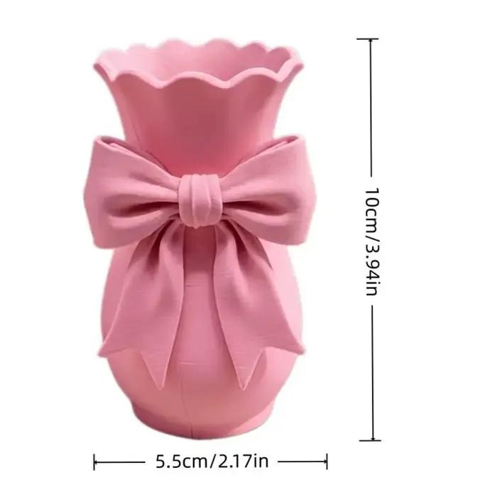 Vases à fleurs en forme de nœud rose au design torsadé