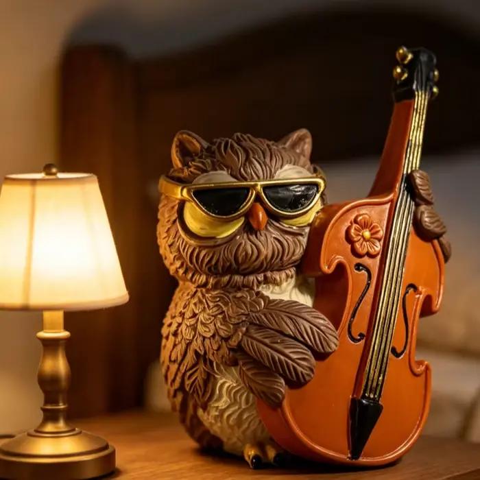Statue d'hibou musicien esin