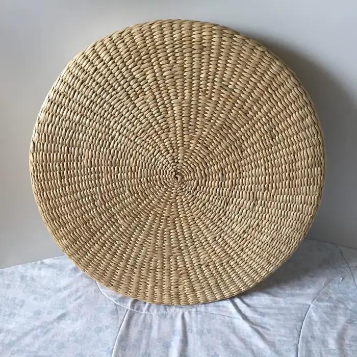 Pouf rond en paille naturelle tissée à la main