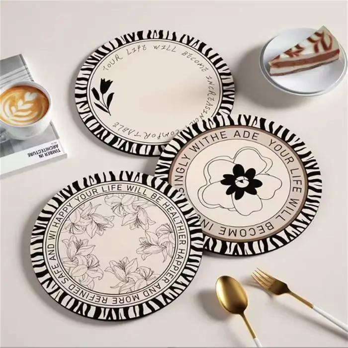 Sets de table isolants en terre de diatomée design rétro noir et blanc pour une décoration intérieure élégante et durable