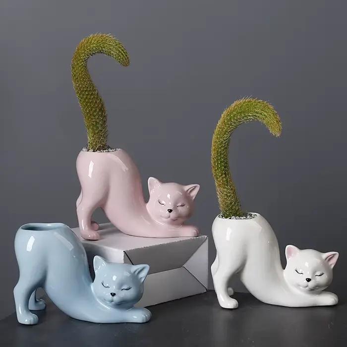 Pot de fleur de chat de dessin animé