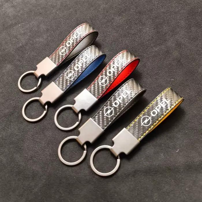 Porte-clés en Fiber de carbone, emblème Opel haut de gamme, pendentif, cadeaux pour Opel Corsa D Astra Insignia Combo OPC, accessoires Vauxhall