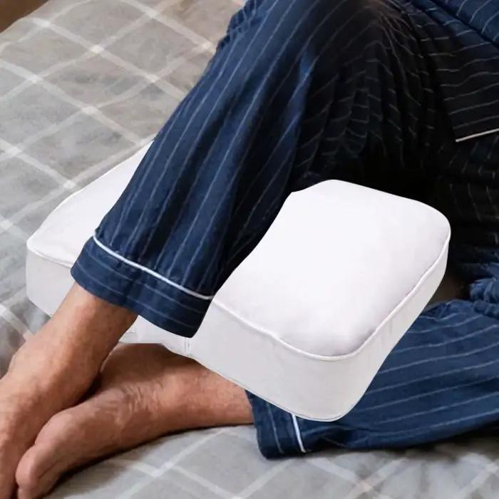Coussin de jambe ergonomique respirant pour dormeurs latéraux, idéal entre les genoux pour l'alignement de la colonne vertébrale et le soutien du dos