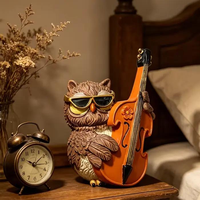 Statue d'hibou musicien esin
