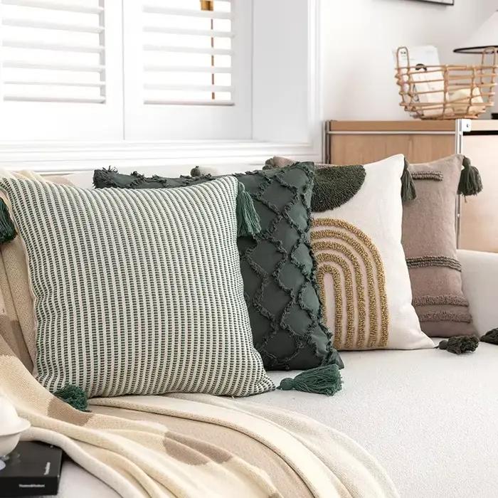 Housse de coussin à pampilles touffetées géométriques indiennes