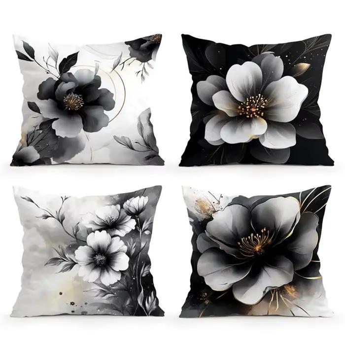Housse de coussin à motifs floraux noir et blanc