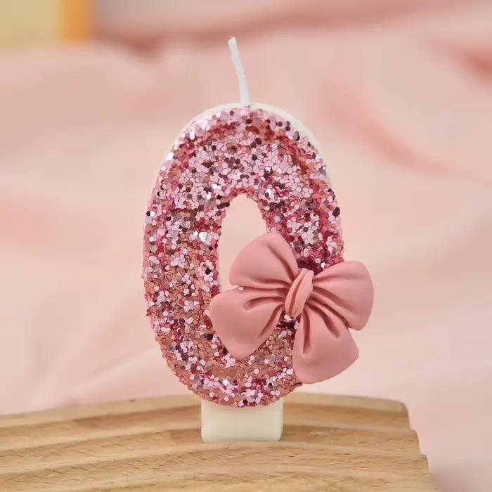 Bougie créative à paillettes scintillantes avec nœud rose pour gâteau d'anniversaire célébration festive élégante occasions spéciales