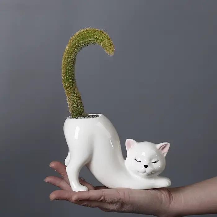 Pot de fleur de chat de dessin animé