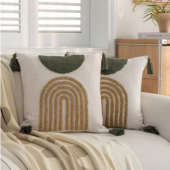 Housse de coussin à pampilles touffetées géométriques indiennes