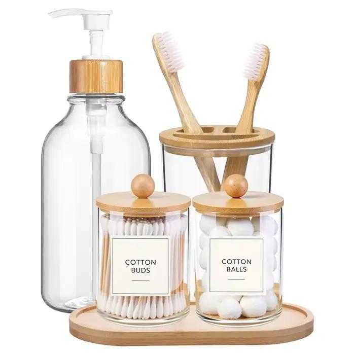 Ensemble d'accessoires de salle de bain en bambou, avec plateau, distributeur de savon en plastique, porte-brosse à dents transparent et 2 supports Qtip, boule de coton, 5 paquets