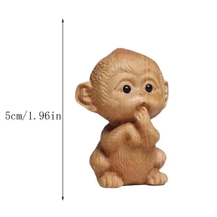 Petites statues d'animaux en bois sculptées à la main