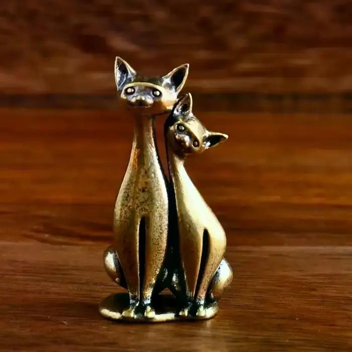 Sculpture de chat double en laiton