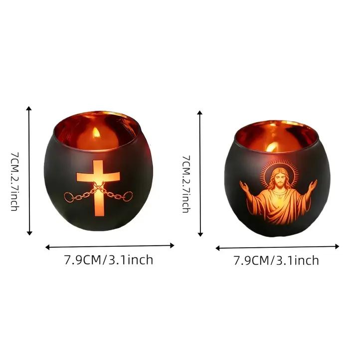 Lot de 2 bougeoirs en verre noir avec figurines et croix