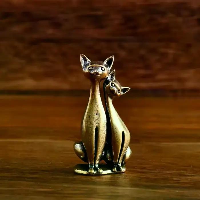 Sculpture de chat double en laiton