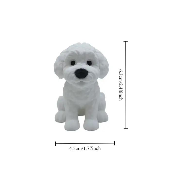Ornement de statue de chiot de chien de devinette