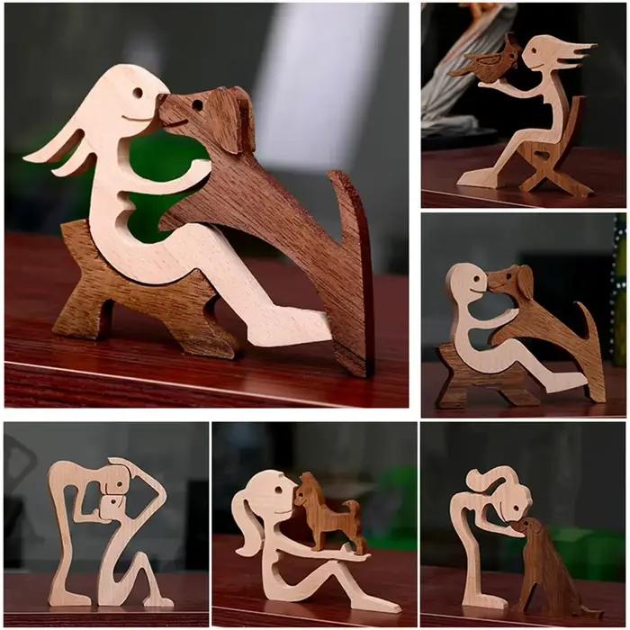 Figurine artisanale en bois de chien et d'humain