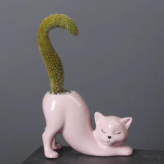 Pot de fleur de chat de dessin animé