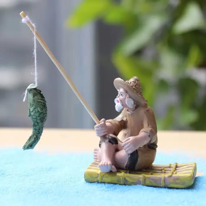 Statue en résine de vieil homme pêcheur