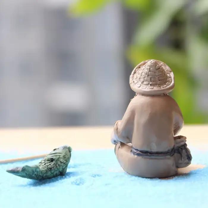 Statue en résine de vieil homme pêcheur