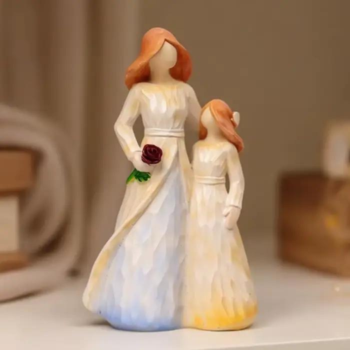 Figurines famille en résine