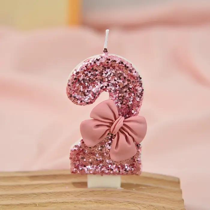 Bougie créative à paillettes scintillantes avec nœud rose pour gâteau d'anniversaire célébration festive élégante occasions spéciales