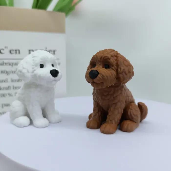 Ornement de statue de chiot de chien de devinette
