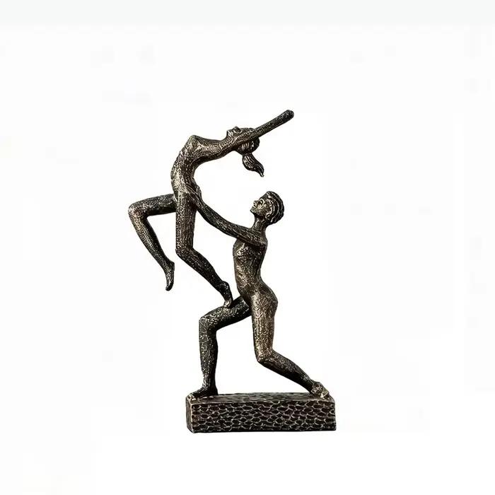Statue de figures abstraites de danseurs doubles moderne en matériaux organiques pour bureau et décoration intérieure
