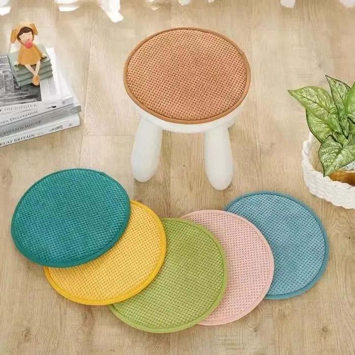Coussin rond de couleur unie