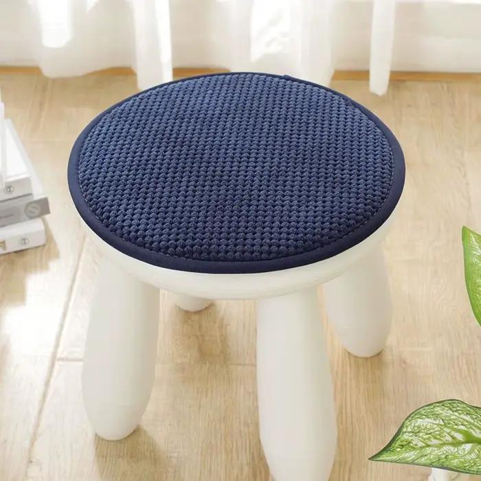 Coussin rond de couleur unie